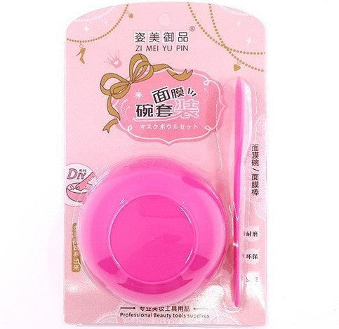 Woman applying hydrating herbal face mask powder for moisturizing treatment